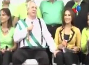 Bolivian mayor is way off in attempting to grab reporter's boob.